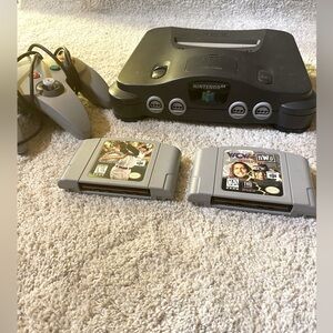Black N64(Console only) Gray N64 Controller and Two Games (see photos)
